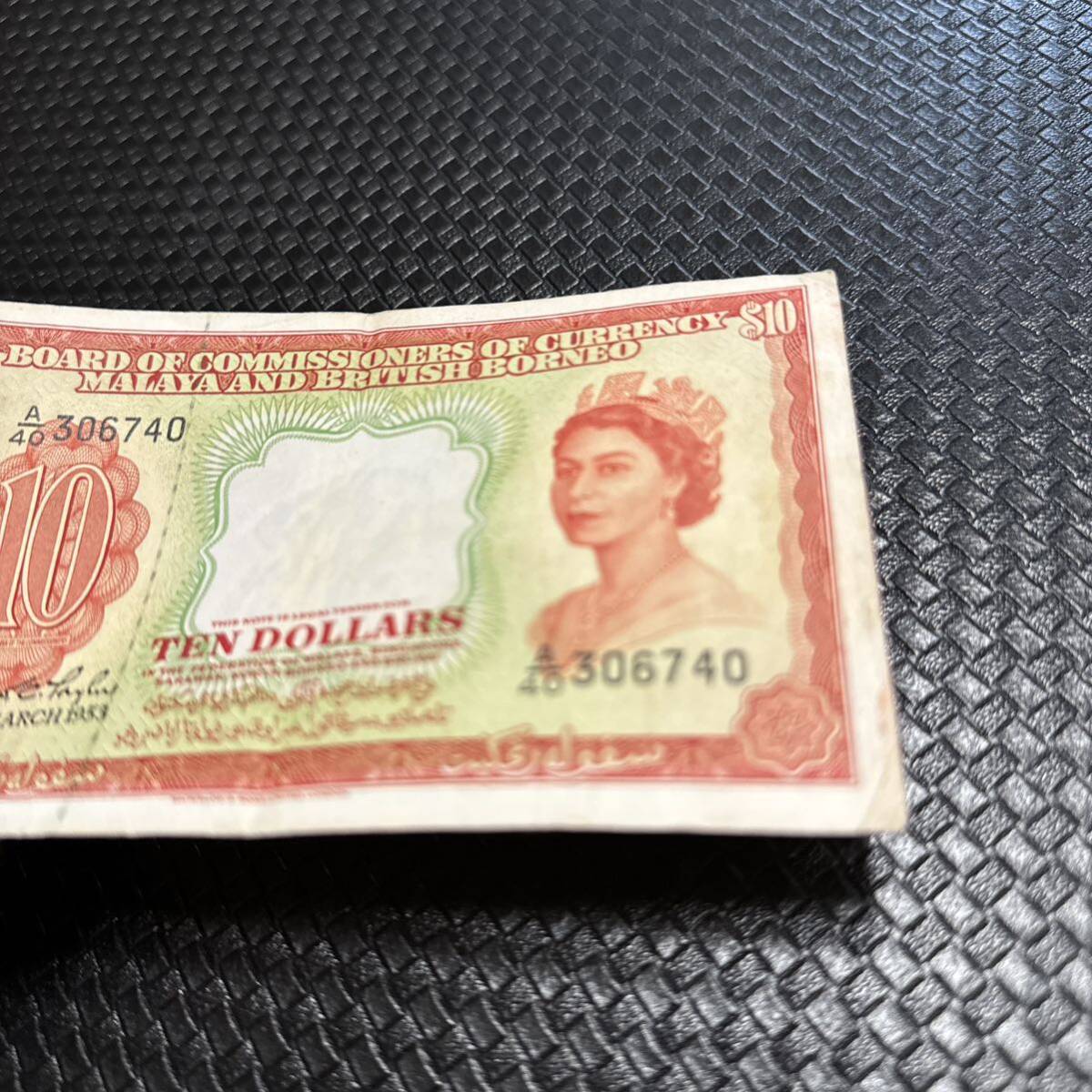  world note rare foreign note malaya britain .bo Rene o10 dollar bill old note 1953 year Elizabeth woman . old . England .