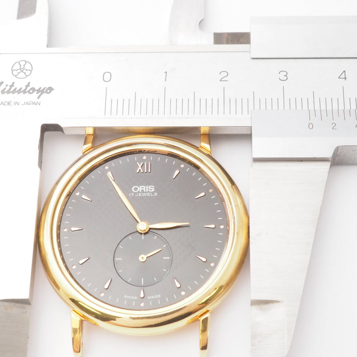 オリス ラウンド型 スモセコ ORIS 7423 手巻き ゴールド 黒文字盤 ボーイズ 腕時計 本体[Pa1535-AM7の画像4