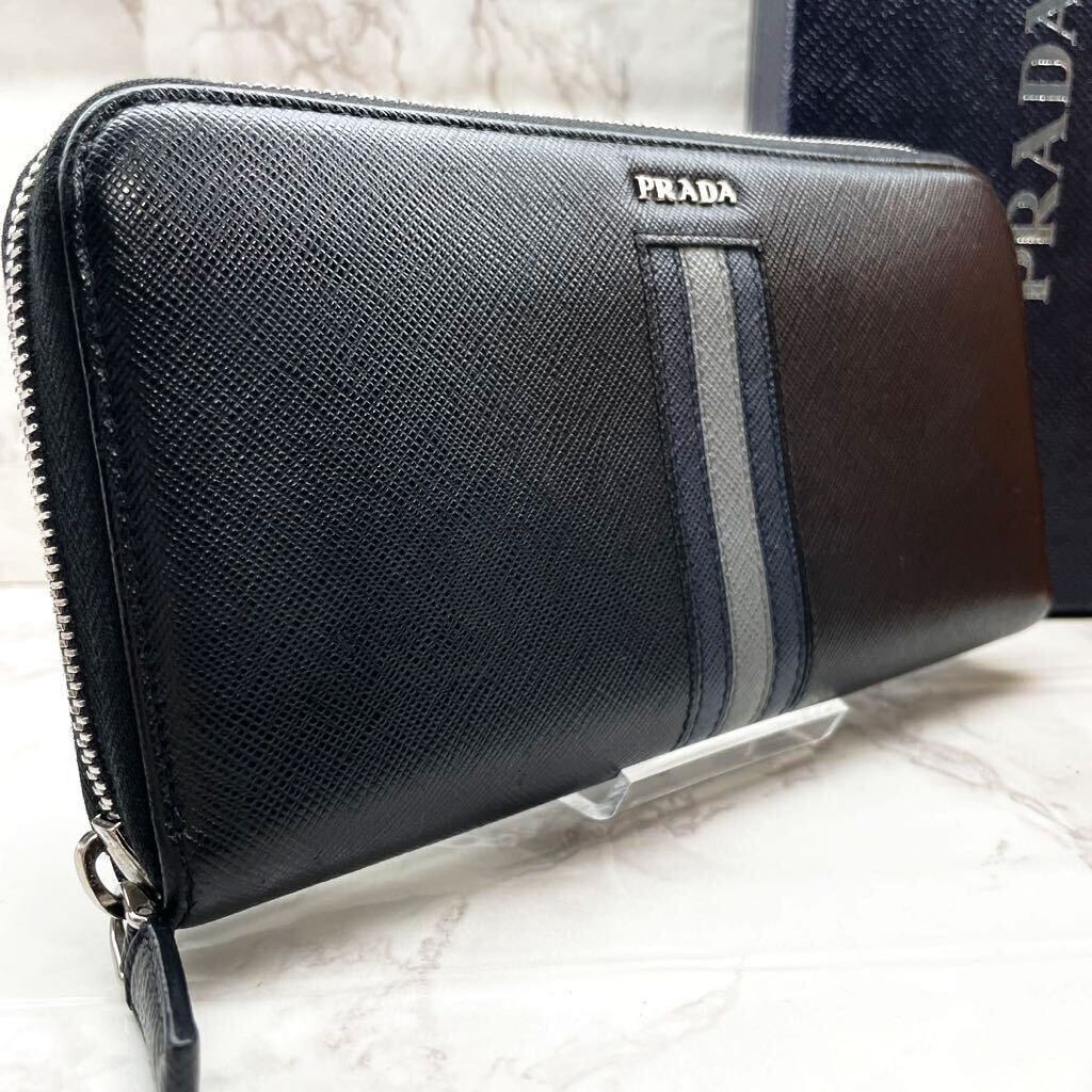 1円/未使用級●プラダ PRADA メンズ ビジネス ラウンドジップ 長財布 サフィアーノレザー 本革 BALTICO ストライプ ライン ロゴ 黒_画像1