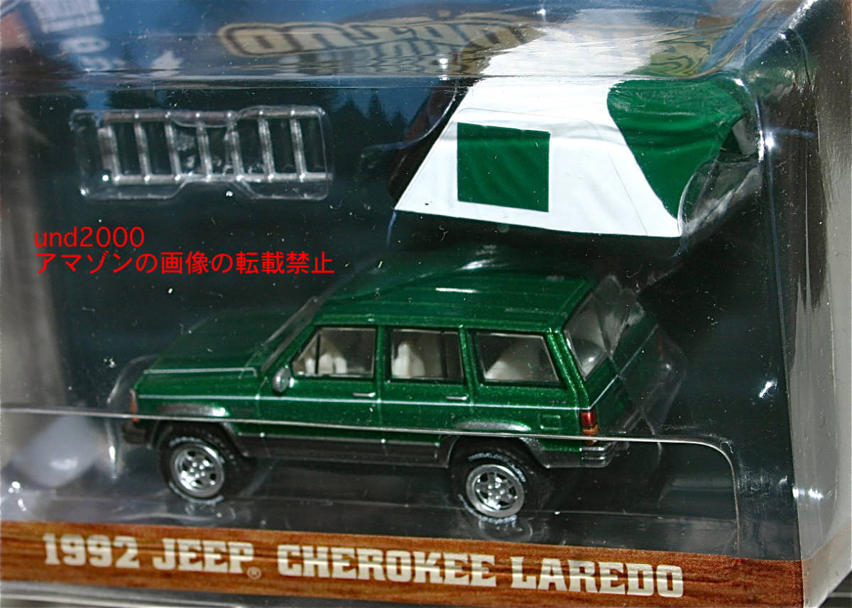 Greenlight 1/64 1992 Jeep Cherokee la ladle - foot p tent Jeep Cherokee Laredo with Modern Rooftop Tent green light 
