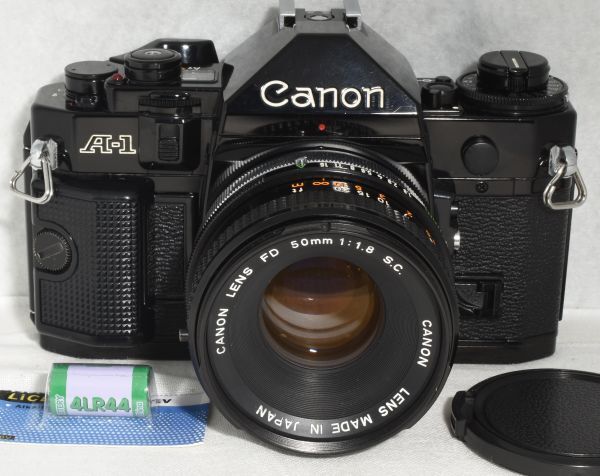 【整備/性能測定済】Canon A-1 ブラック＋FD 50mmF1.8 S.C._ P,S,A機能OK(1860864_44)_出品物→本体、レンズ、キャップ、電池