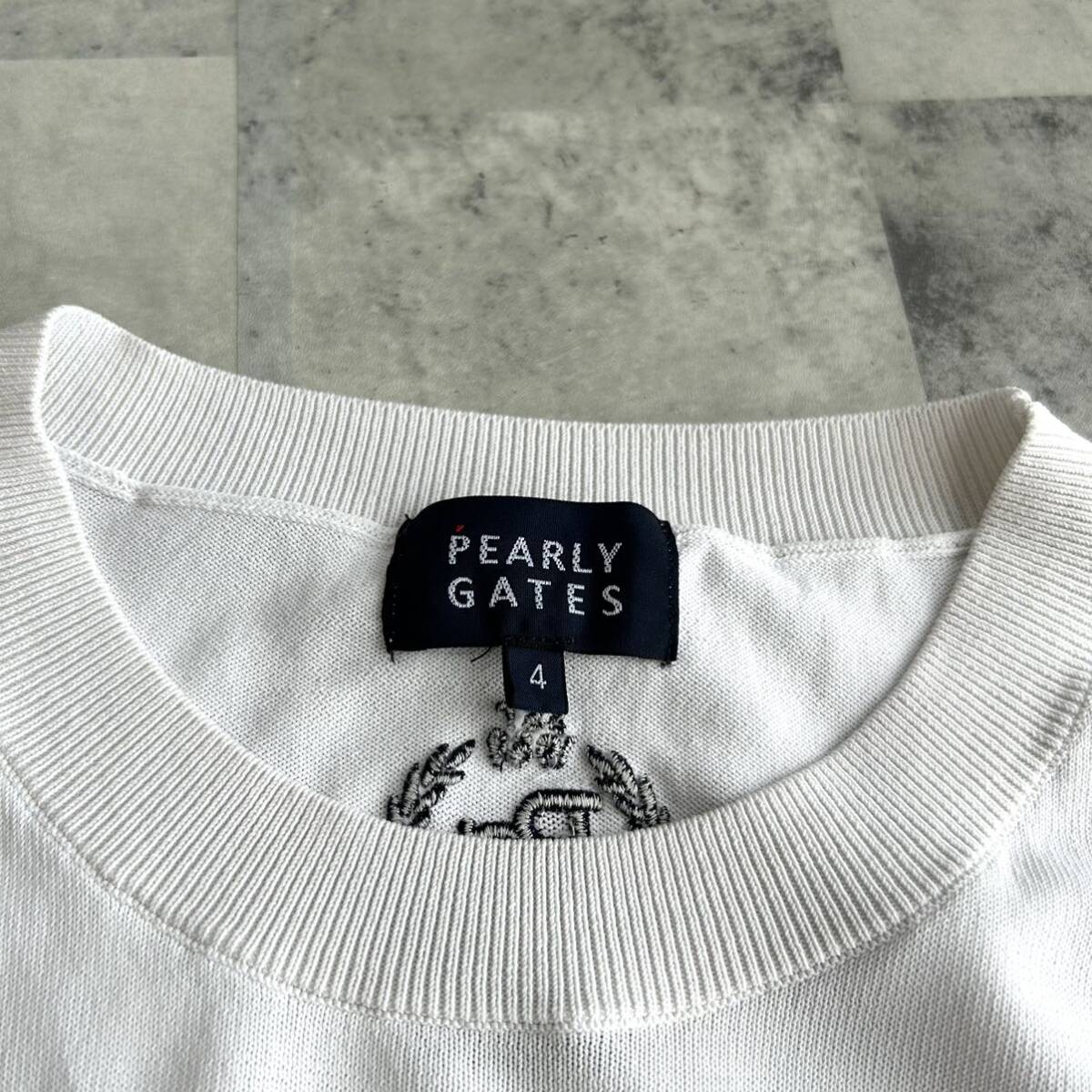  Pearly Gates [ популярный один надеты ]PEARLY GATES вязаный свитер Golf одежда нашивка Logo белый стрейч эластичность M соответствует 