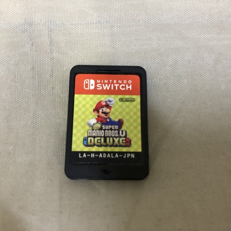 【中古品】任天堂 NINTENDO SWITCHソフト New スーパーマリオブラザーズ Uデラックス (管理番号：046113)の画像1