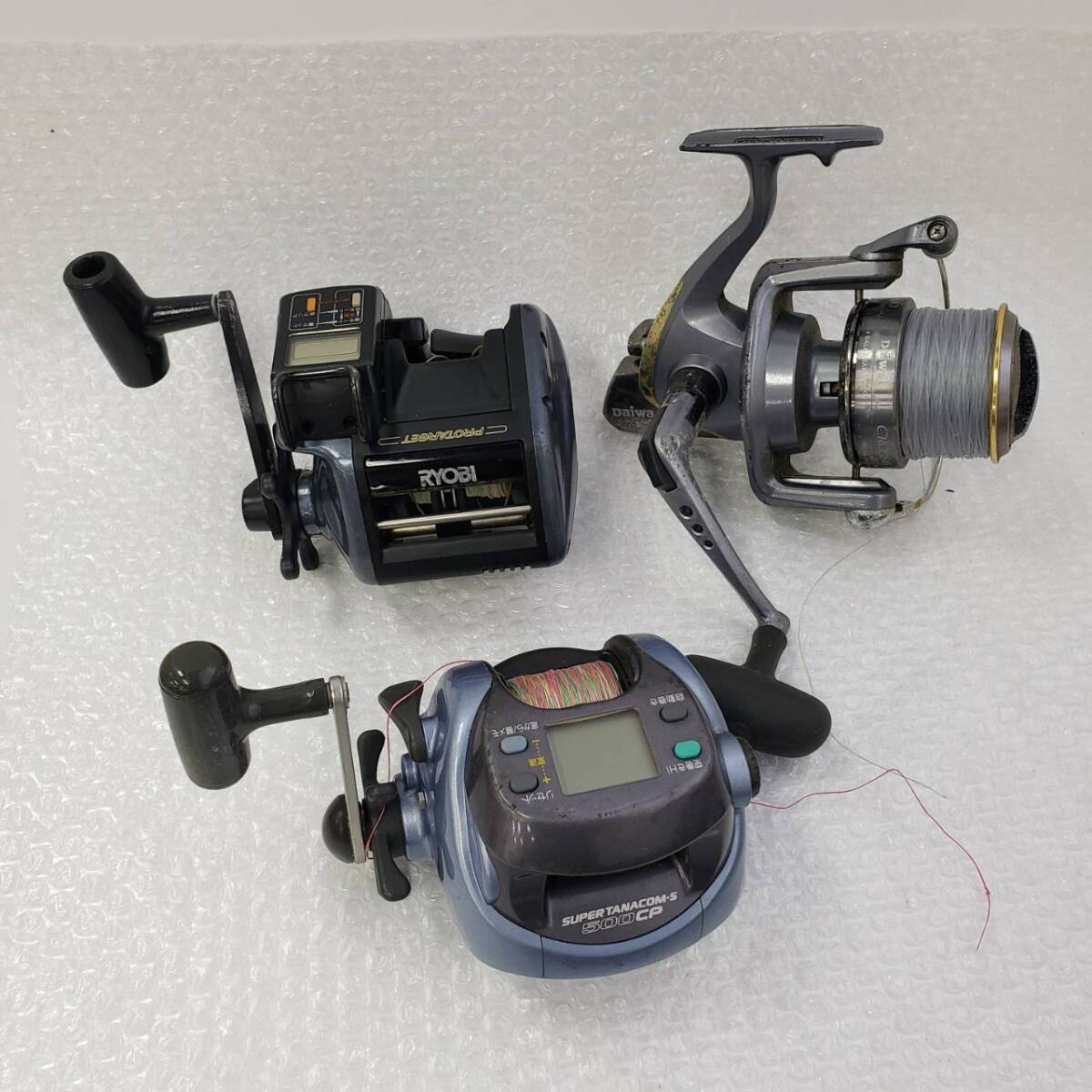 M061(8900)-595　リール20個まとめ　約8.9㎏　Daiwa　ダイワ　SHIMANO　シマノ　RYOBI　リョービ　他　状態様々_画像2