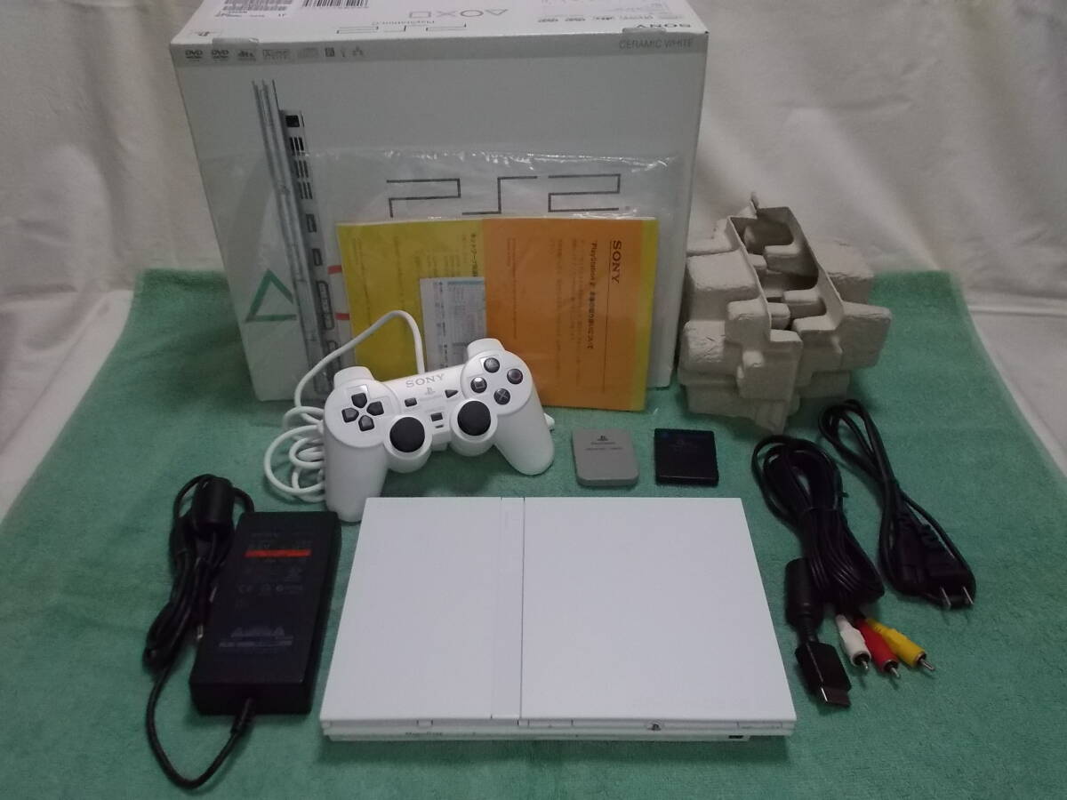 大人気新品セール ブ PS2薄型 白 ほぼ未使用コントローラー【円 箱+取説/レンズ新品 本体
