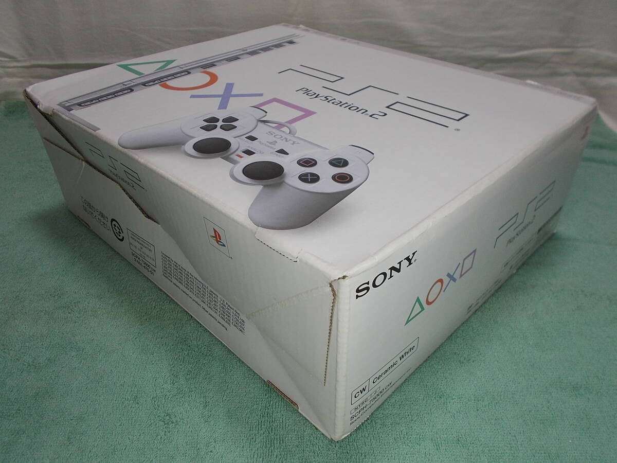卸し売り購入 PS2薄型 白 箱+取説/レンズ新品 ほぼ未使用コントローラー【円 本体