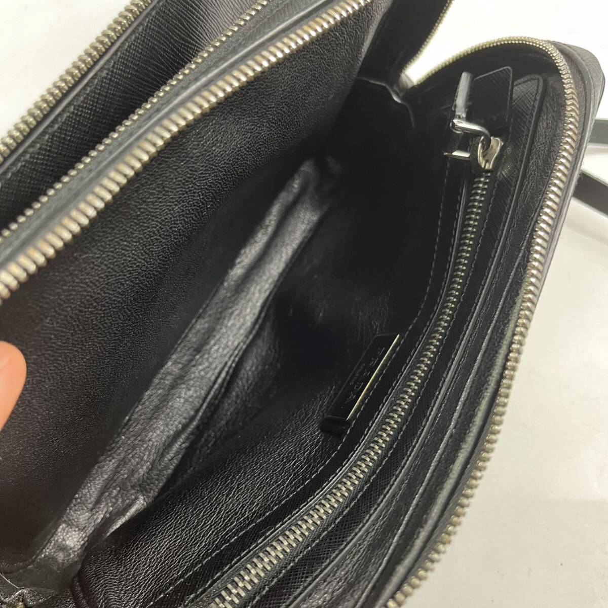 1 jpy ~[ hard-to-find goods ] PRADA Prada clutch bag black black business bag safia-no leather men's second bag double Zip 