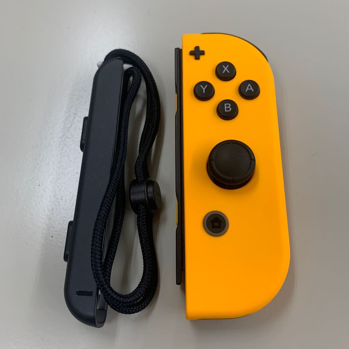 ジャンク品 ジョイコン Joy-con R 右 ネオンオレンジ Nintendo ストラップ付き 0519-58_画像1