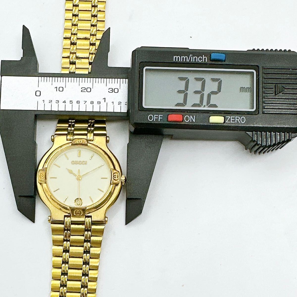 0503g グッチ GUCCI 稼働品 9200M メンズ 腕時計 クォーツ 電池式 QZ デイト ゴールドカラーの画像8