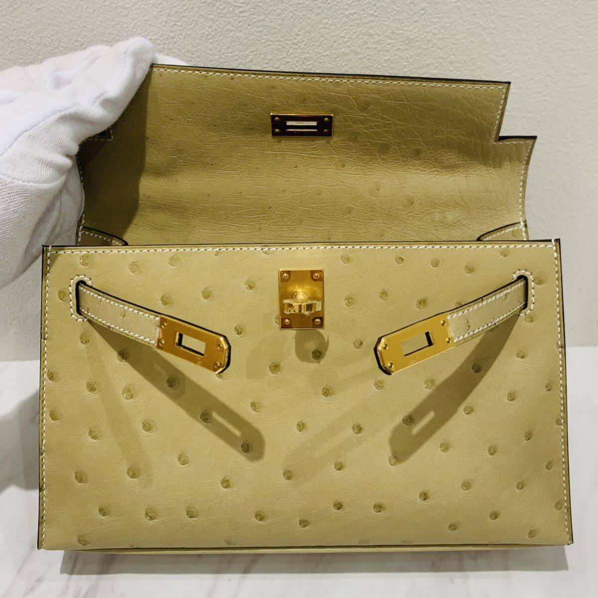 HERMES Hermes pochette Kelly Ostrich pa-shu man U stamp (2022 year made ) Gold metal fittings new goods 