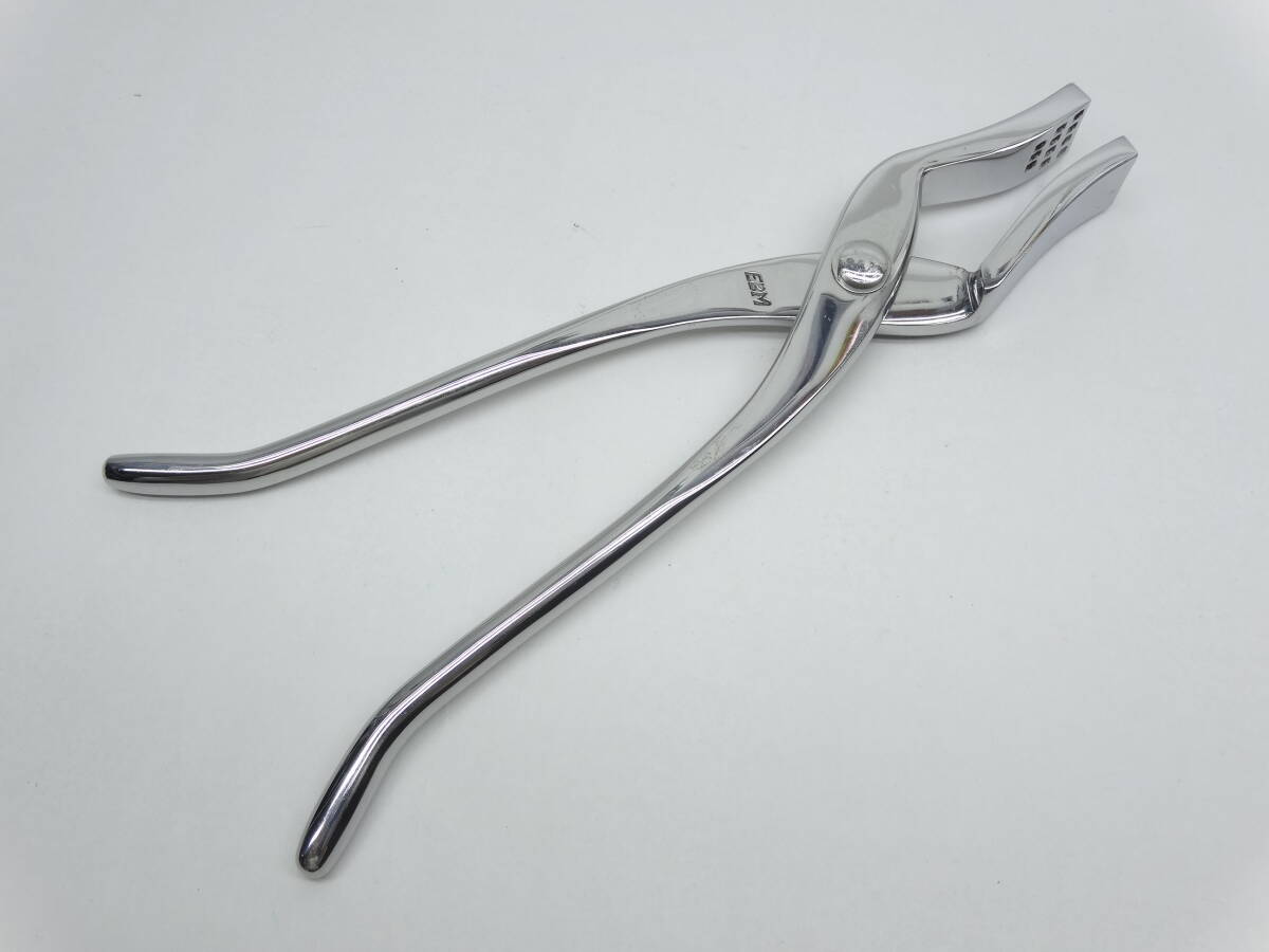y3547 EBM pincers . potholder made of stainless steel cookware 
