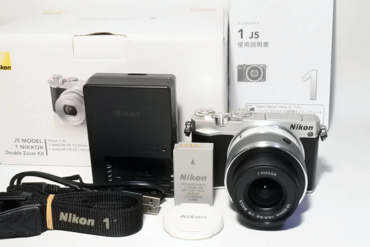 *Nikon1 J5 +ZOOM lens + battery + with charger .**