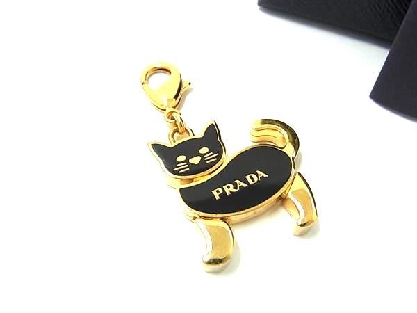 1 иен # прекрасный товар # PRADA Prada кошка кошка брелок для ключа очарование женский оттенок черного × оттенок золота FC0821