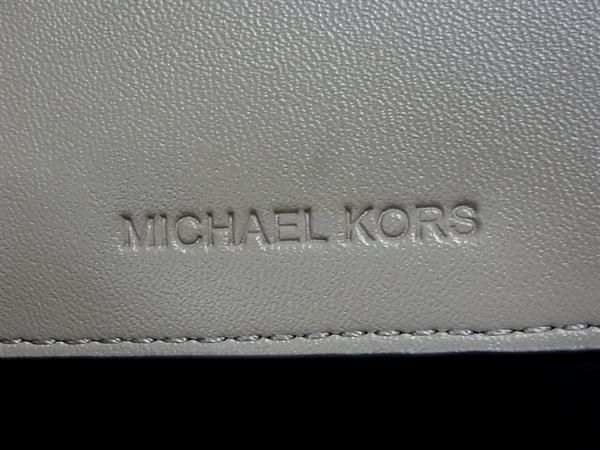 ■新品■未使用■ MICHAEL KORS マイケルコース MK柄 PVC 二つ折り 財布 ウォレット レディース ブラウン系 BJ1978_画像6