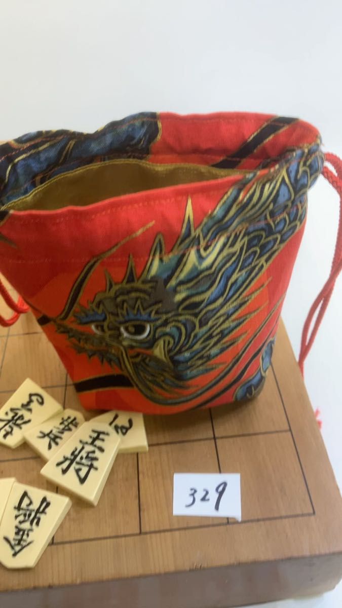 A cute bag for storing shogi pieces, 赤龍柄の駒袋:持ち運びが便利な巾着タイプNo.329 