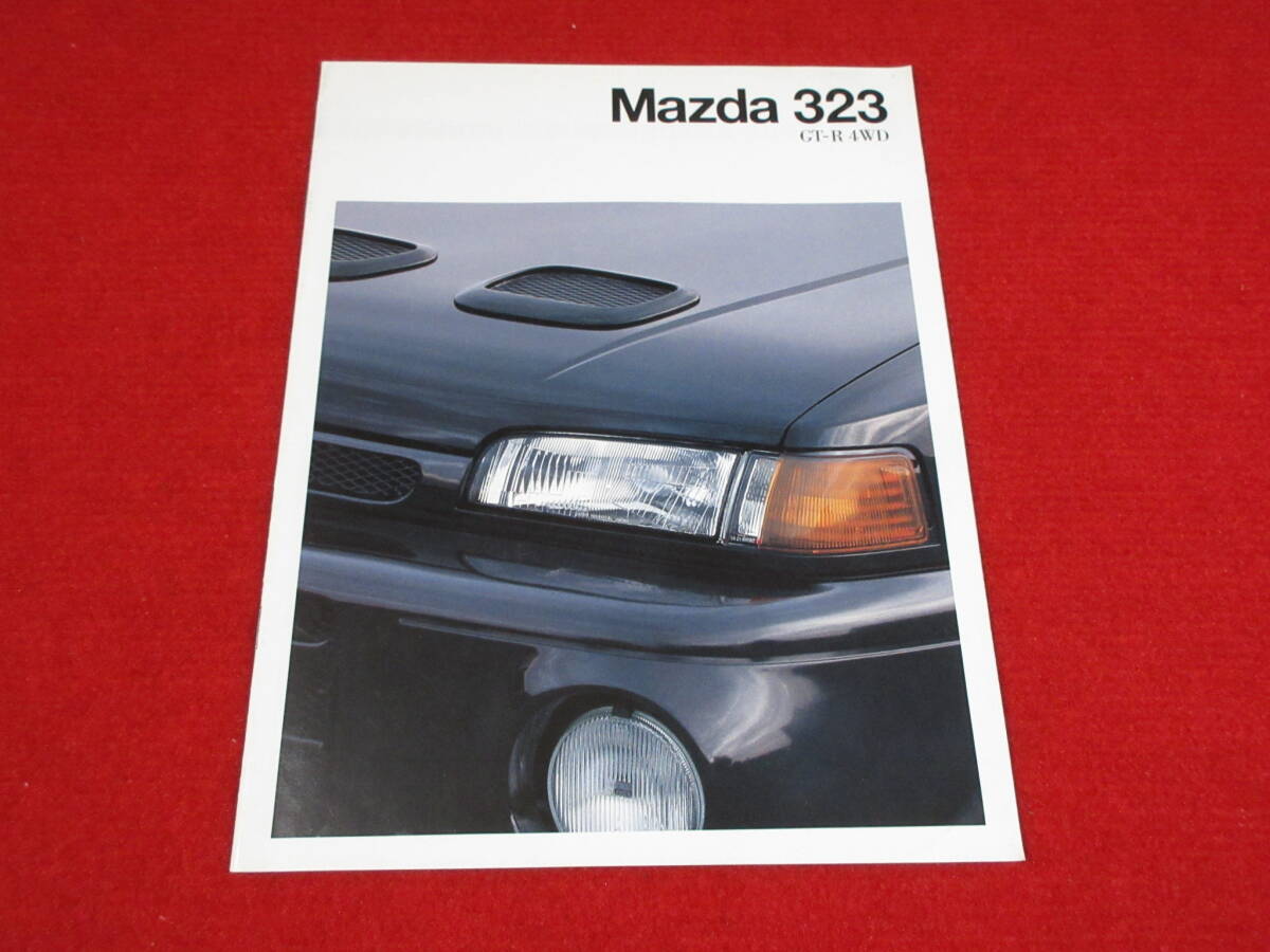 ●　MAZDA　323　左H　1992　平成4　ドイツ　カタログ　●_画像1