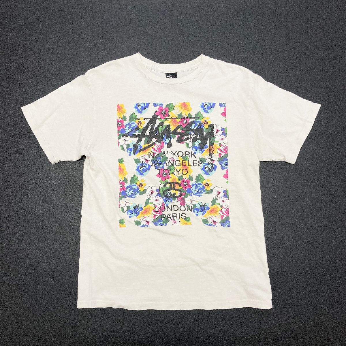 ●STUSSY ステューシー Tシャツ トップス 半袖 丸首 フロントデザイン 花柄 フラワー SSリンクロゴ ホワイト サイズM メンズ 0.18kg●_画像1