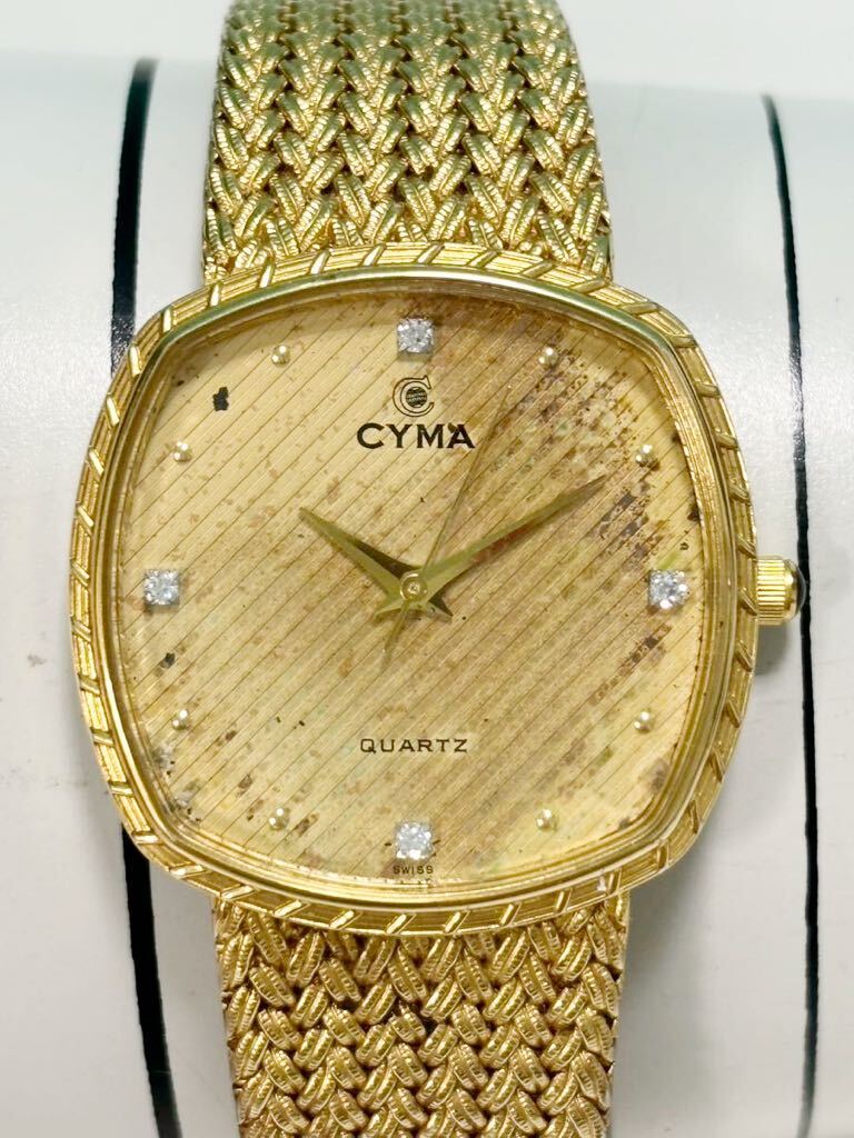  operation goods CYMA Cima men's wristwatch Gold × Gold SS quartz 604SP 4P diamond battery replaced 