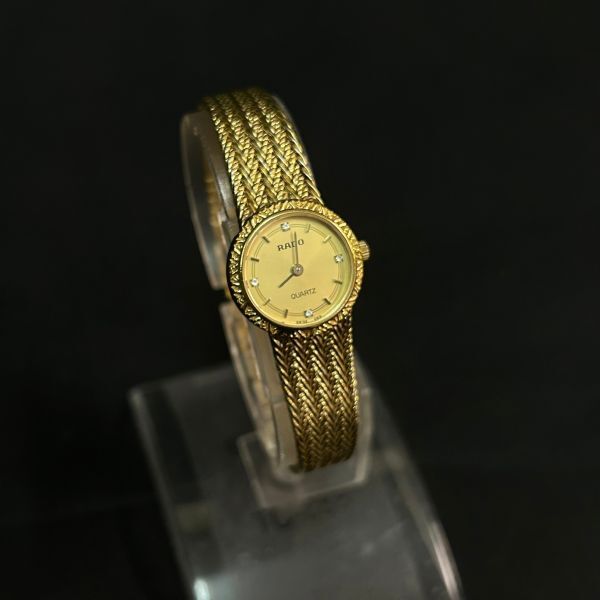 EDc049Y06 クォーツ RADO ラドー 133.5301.2 ゴールドカラー文字盤 4P石付き レディース腕時計の画像1