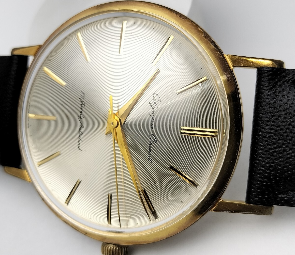 オリエント オリンピア 手巻き式腕時計 1961年製造開始 円周線上加工文字盤の画像3