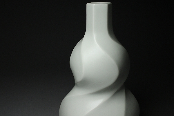 *# modern art!..... white ... sake bottle white porcelain one wheel .. objet d'art also!#*.:.book@..