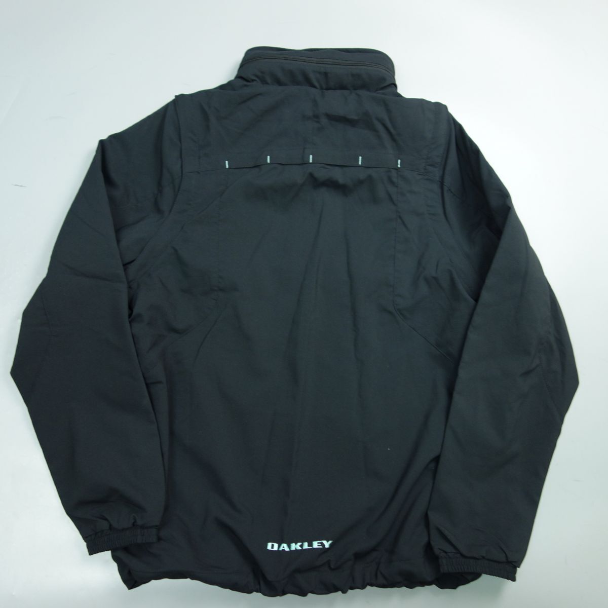  ultimate beautiful goods OAKLEY Oacley 2WAY convertible hood storage pattern jacket black men's L Golf wear 