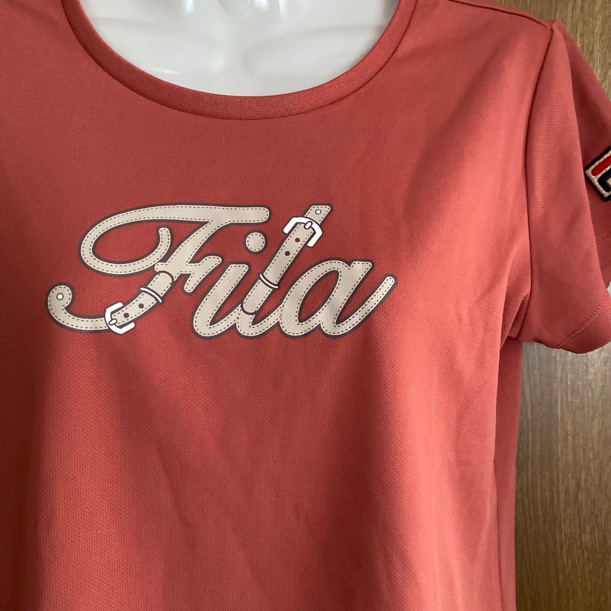 フィラ FILA テニスウェア レディース グラフィックTシャツ VL2521 2022FW 半袖Tシャツ　オレンジ