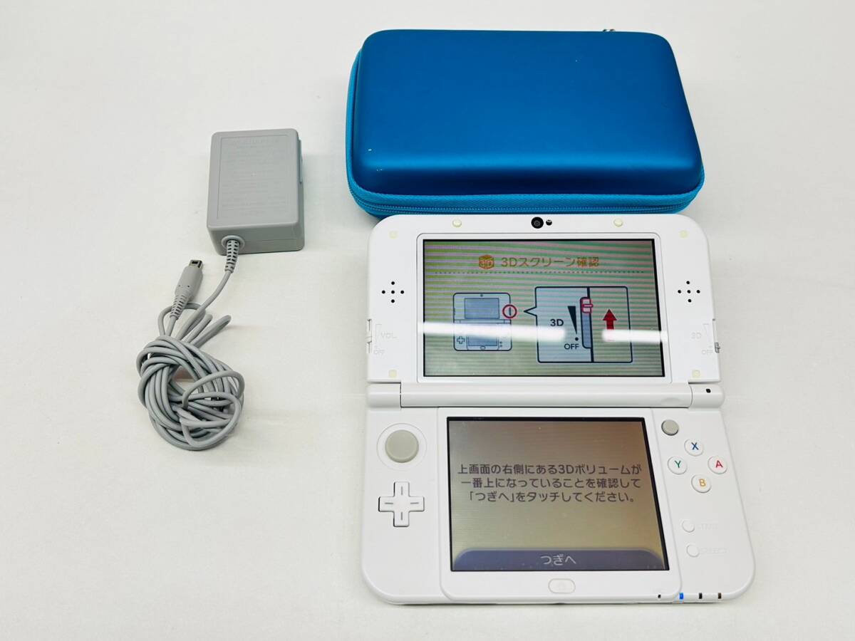 Y516-K44-4030 任天堂 Nintendo ニンテンドー 3DS LL 本体×1点 RED-001 白 ホワイト ゲーム 充電器・ケース付き 通電/初期化OK_画像1