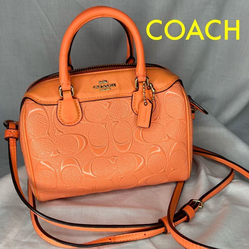 COACH シグネチャー ショルダーバッグ ミニボストン ネオオレンジの画像1