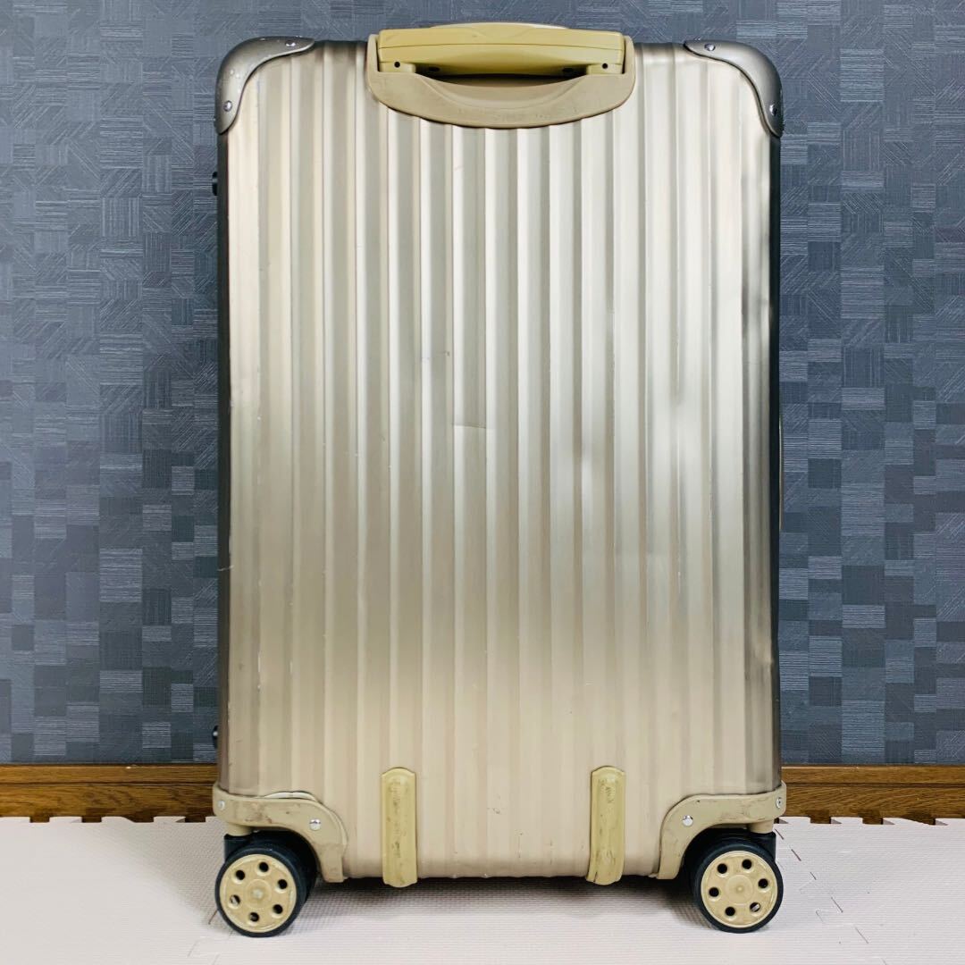 [ records out of production ]RIMOWA Rimowa TOPAS topaz Titanium titanium 64L 4 wheel TSA lock champagne gold series gold color check in M original 