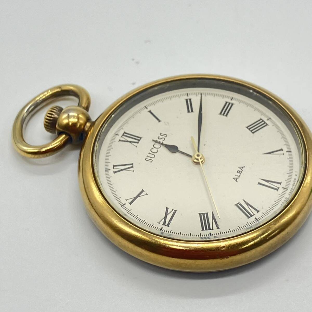 1 jpy ~ 4F ALBA SUCCESS pocket watch V306-9A00 071658 quarts QUARTZ operation not yet verification white face antique BASE METAL BEZEL Gold metal fittings 