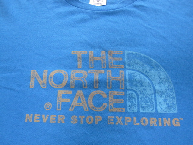 USEDキレイ THE NORTH FACE ノースフェイス 半袖Tシャツ メンズS 青 オレンジ/水色プリント_画像1