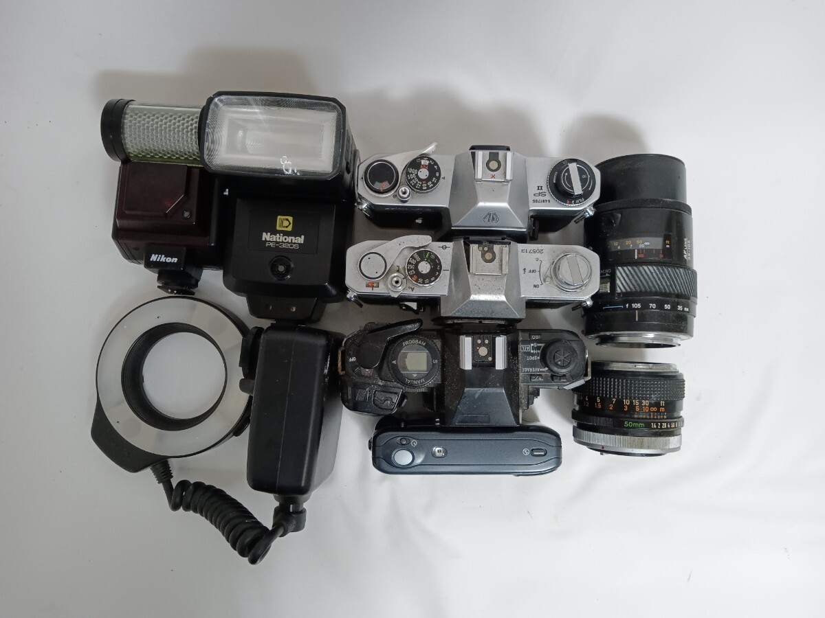 ジャンクまとめ売り Canon Pentax含むフィルムカメラ Canon FD 50mm 1.4含むレンズ Nikonストロボ含む 計9個 動作未確認 同梱不可 RJ32の画像3