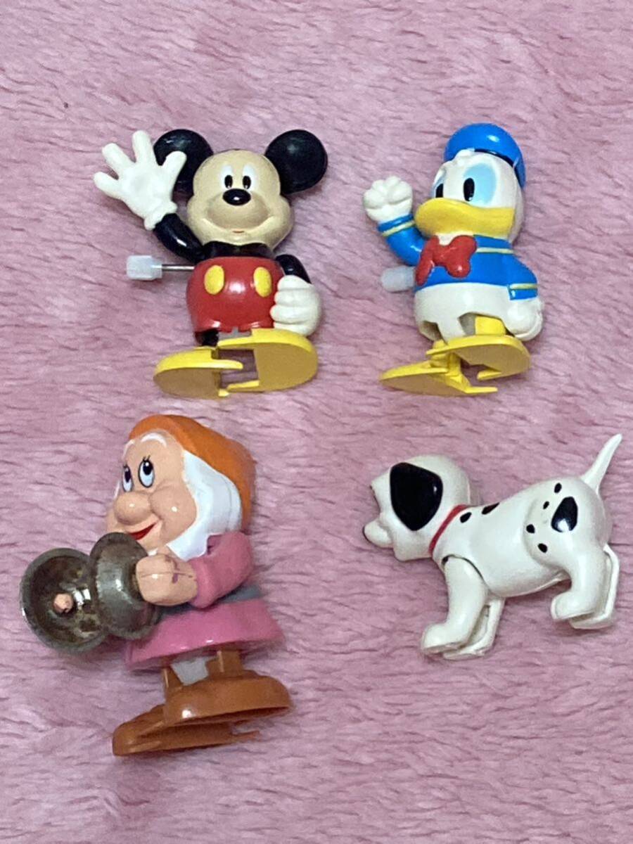 ★ ディズニーキャラクターゼンマイ人形4種セット 中古品 ミッキーマウス、ドナルドダック、7人の小人、101匹ワンちゃんの画像1