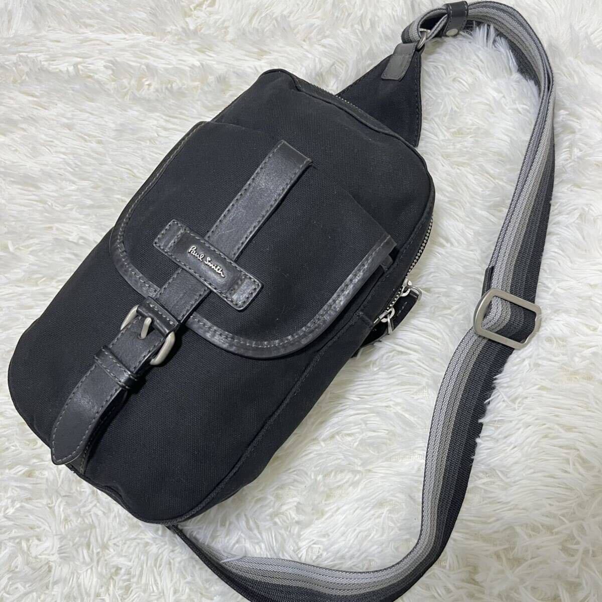 1 jpy [ adult goods .]Paul smith Paul Smith body bag leather × canvas Logo stripe black 