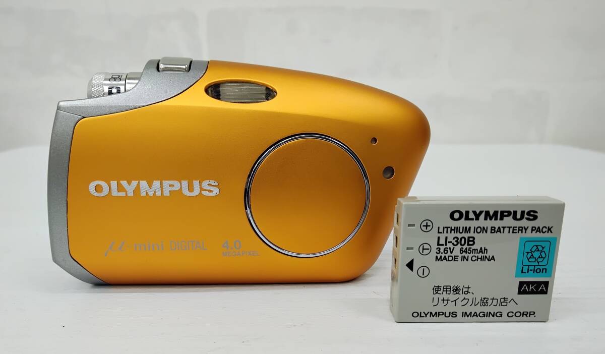 OLYMPUS/ Olympus μ-mini DIGITAL 4.0megapixel orange электризация * работоспособность не проверялась Junk с некоторыми замечаниями текущее состояние товар 