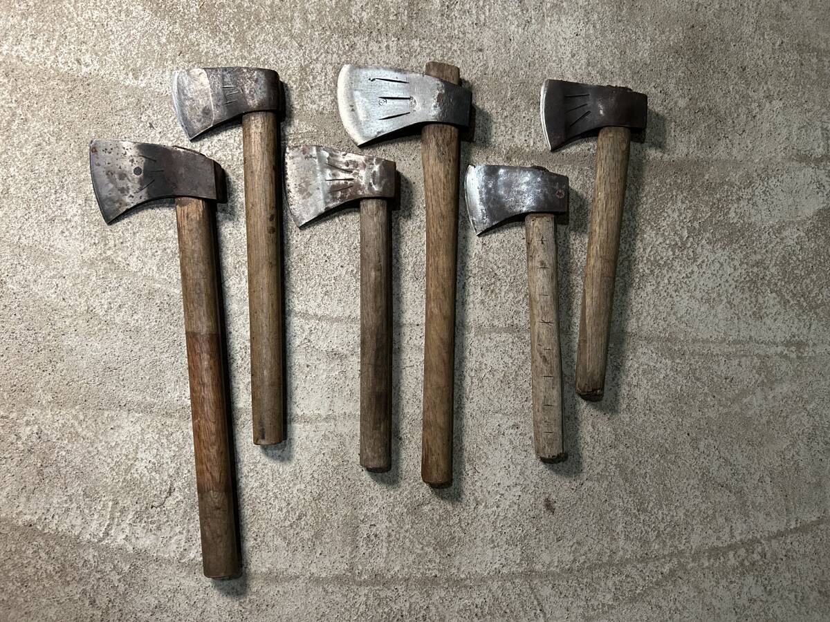  mountain . tool firewood tenth branch strike axe hatchet set together hand strike mountain . earth .. industry carpenter's tool old tool f