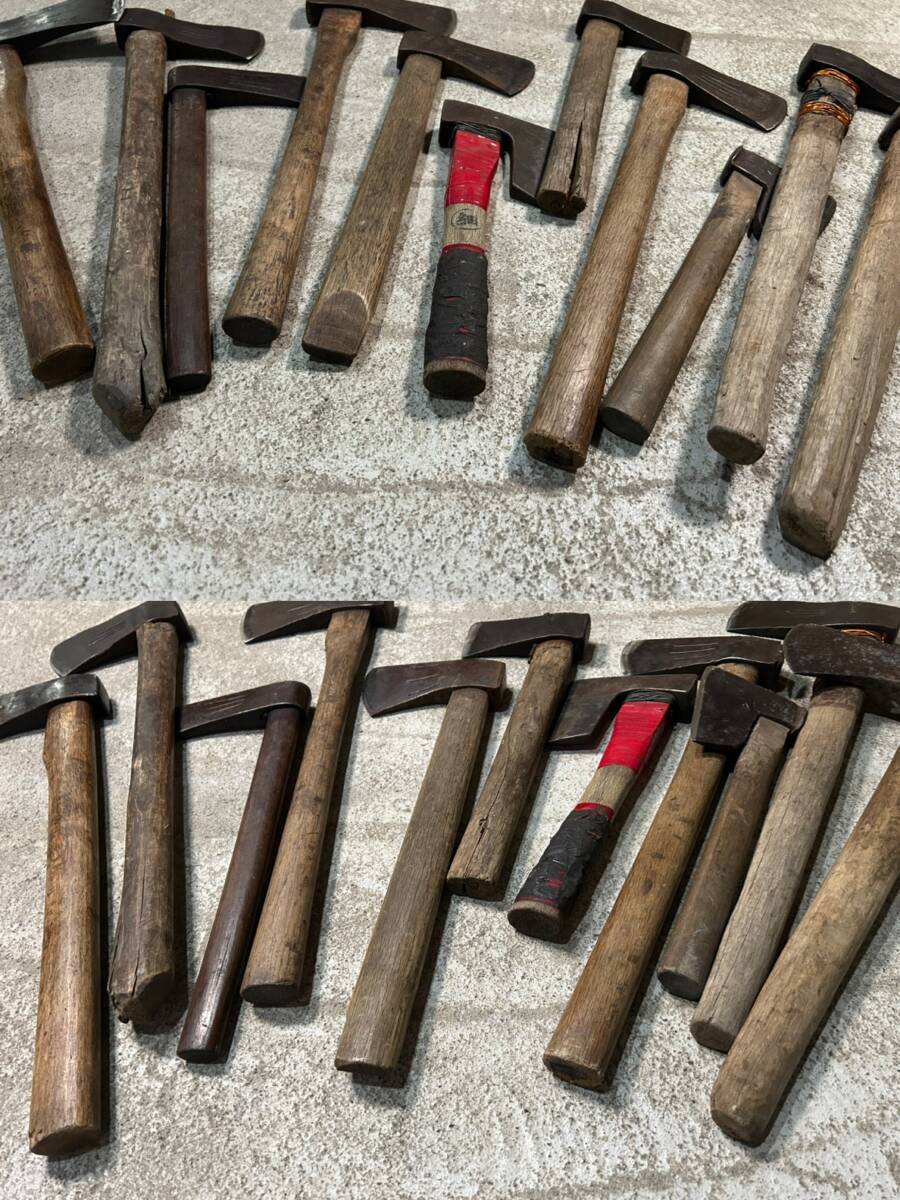  mountain . tool firewood tenth branch strike axe hatchet set together hand strike mountain . earth .. industry carpenter's tool old tool b