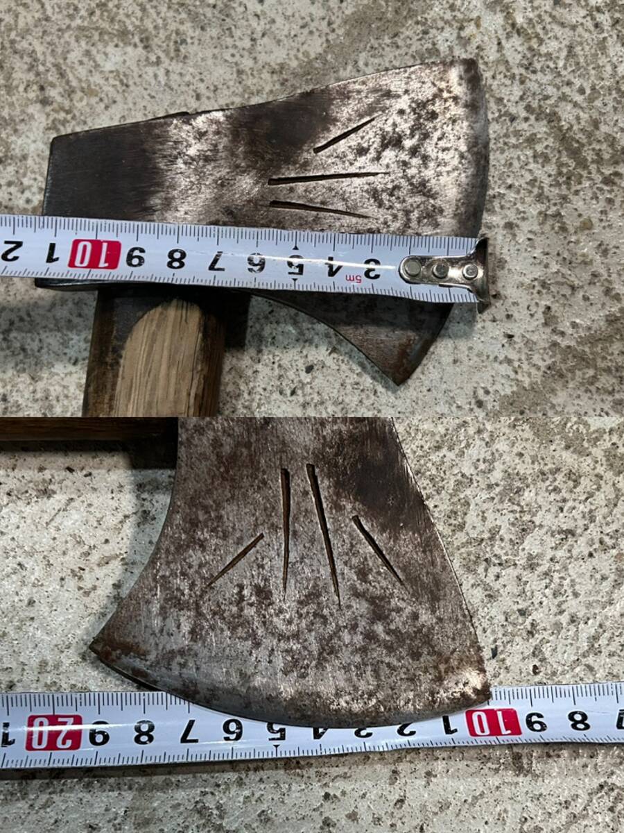  mountain . tool firewood tenth branch strike axe hatchet set together hand strike mountain . earth .. industry carpenter's tool old tool dn