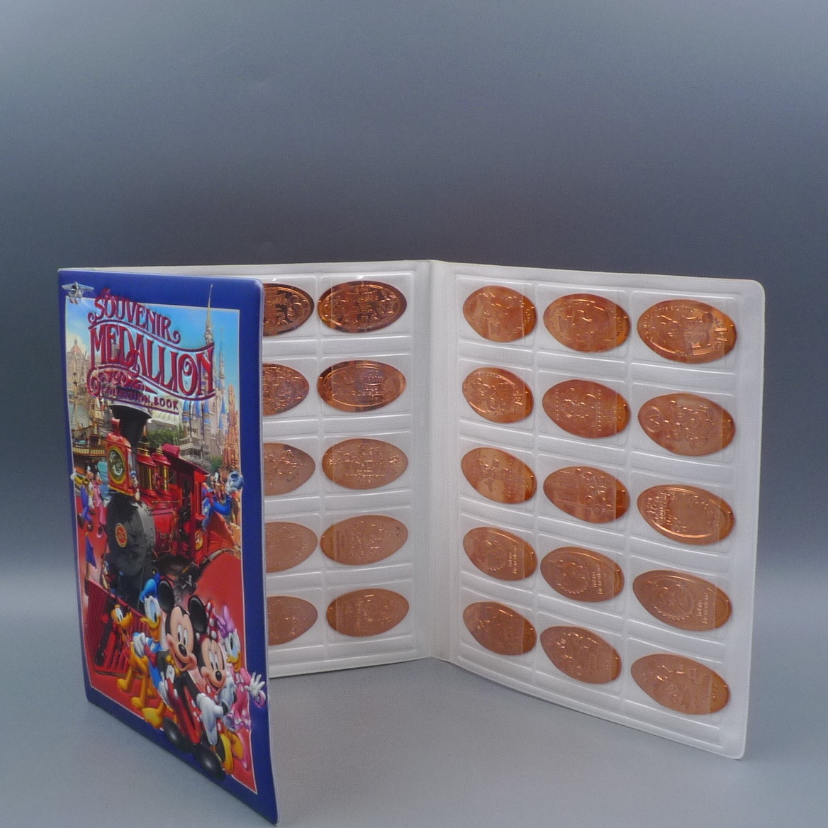 コレクションブック付き ディズニー 2014年 ハロウィーン 限定 等 スーベニアメダル45枚 グッズセット グッズ_画像1