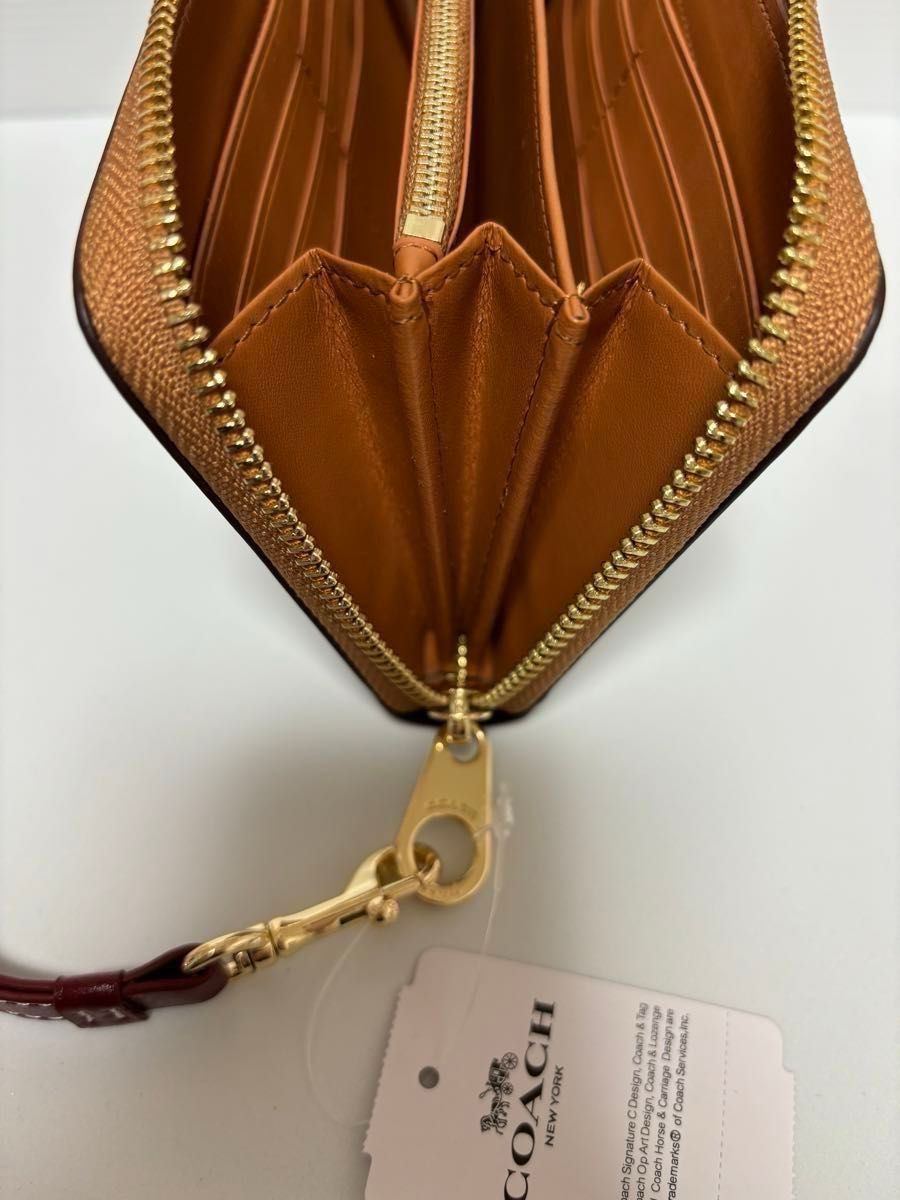 新品　コーチ　長財布スヌーピー　未使用 coach かわいい　CE705