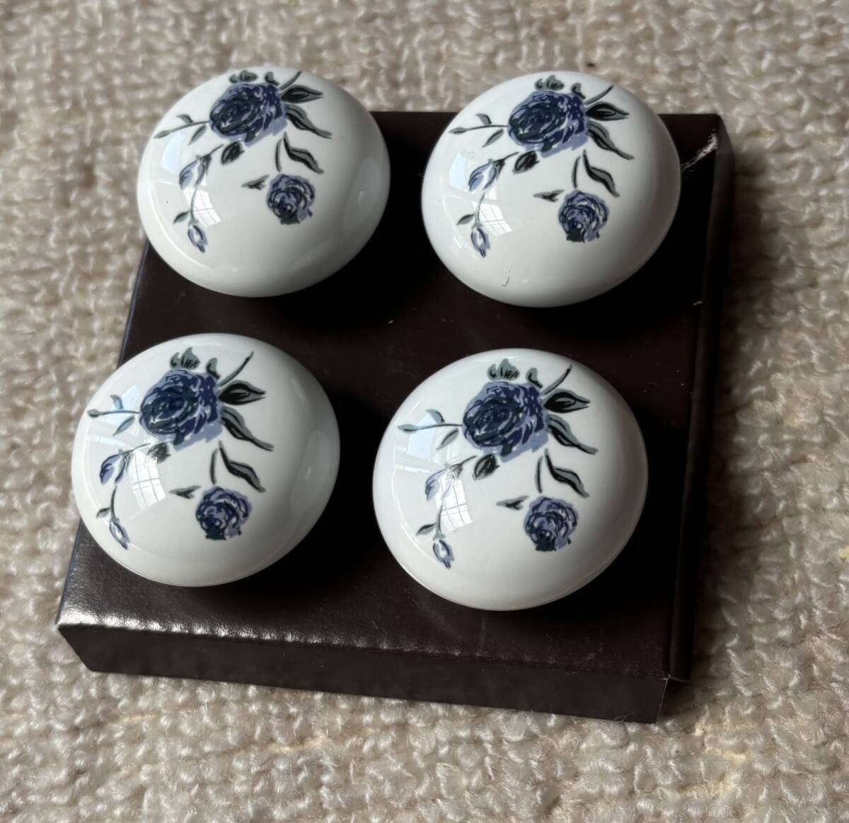  ceramics made floral print. drawer knob 4 piece set unused 