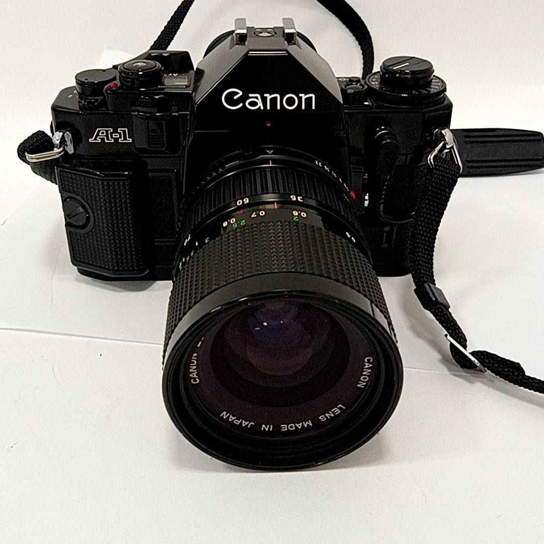 #0961 Canon キャノン A-1 一眼レフ レンズ FD 35-70mm 1:4 ZOOM LENS スピードライト 155A ケース付き 動作未確認 現状品 カメラ 中古 _画像2
