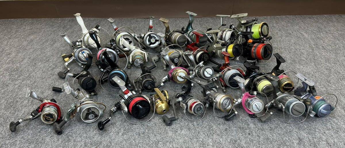 ①E15UC14 スピニング リール 31点 まとめ Daiwa SHIMANO RYOBI ダイワ シマノ リョービ など 大量 釣竿 フィッシング _画像1