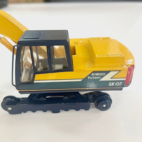  that time thing junk toy KOBELCO Yutani -ply pressure shovel Yumbo SK07 minicar made in Japan construction vehicle work car present condition goods [ secondhand goods ] Sapporo departure 