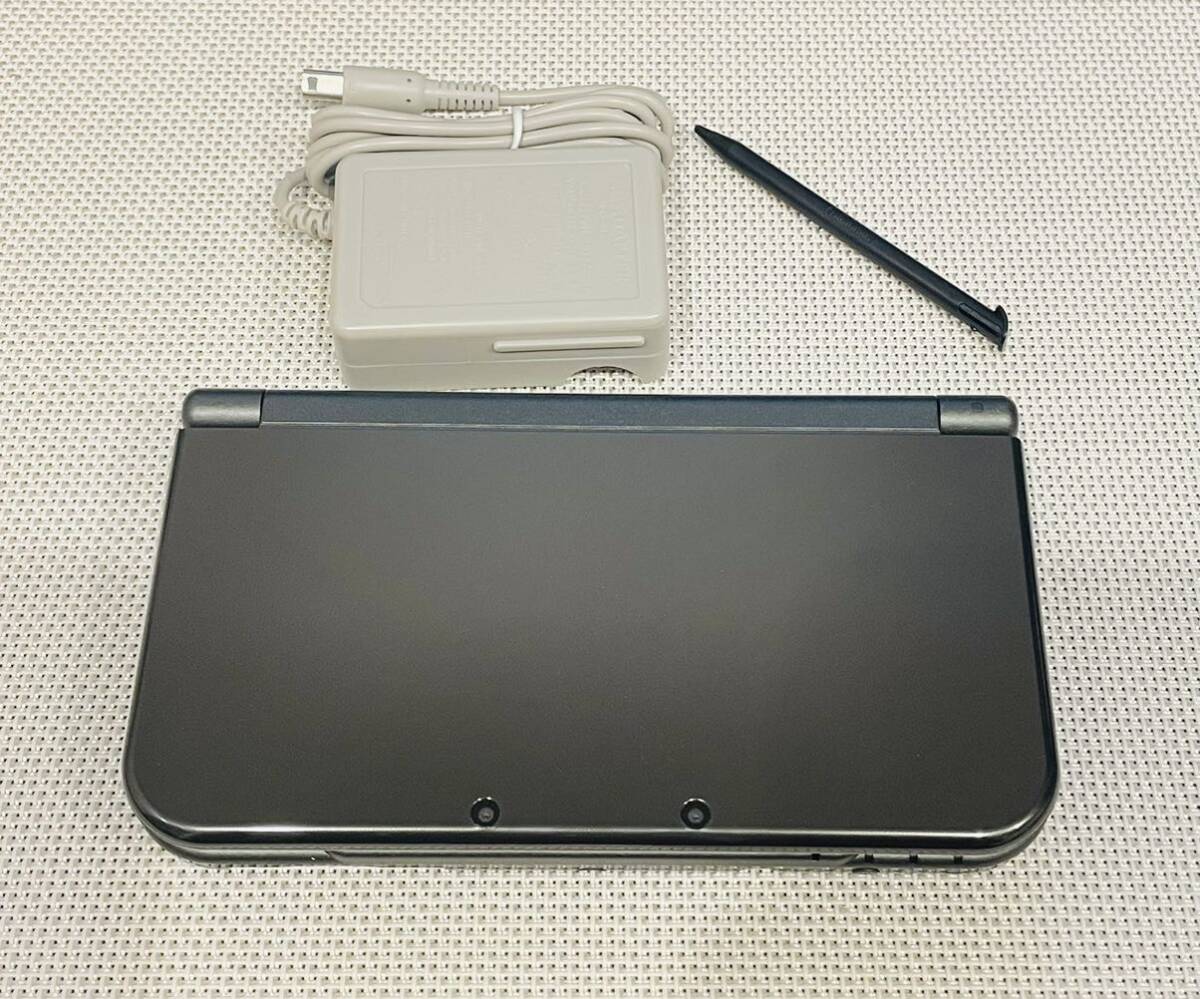 Newニンテンドー3DSLL メタリックブラック 本体動作品　送料無料　付属品付き　Nintendo 任天堂 _画像1