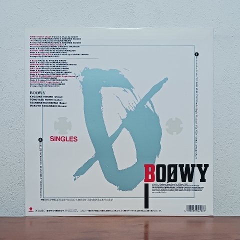 LP/ BOOWY「シングルス / SINGLES」ベスト盤 / 歌詞カード付 / B・BLUE ONLY YOU わがままジュリエット NO.NEW YORK CLOUDY HEARTの画像2
