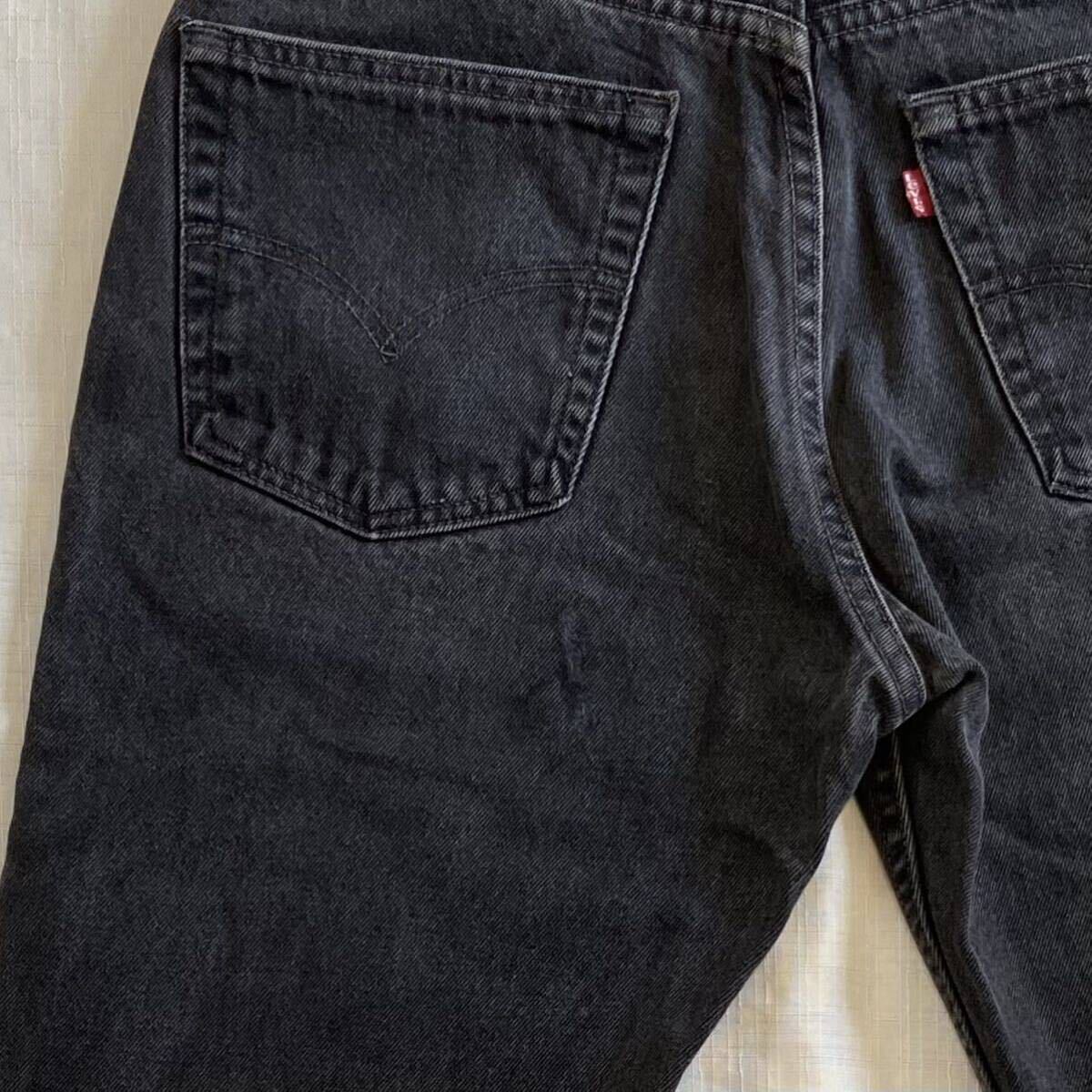 90sビンテージ LEVIS 505 USA製 黒 ブラックデニム パンツ W32 裾 オリジナル アメリカ製 ブラックジーンズ リーバイス LEVI'S 米国製 古着_左バックポケット下に少しタタキのリペア。