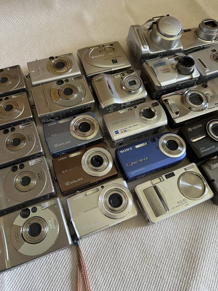 キヤノン/ソニー/カシオ/フジ/ニコン等の30 個のジャンクデジタルカメラの大量販売_画像3