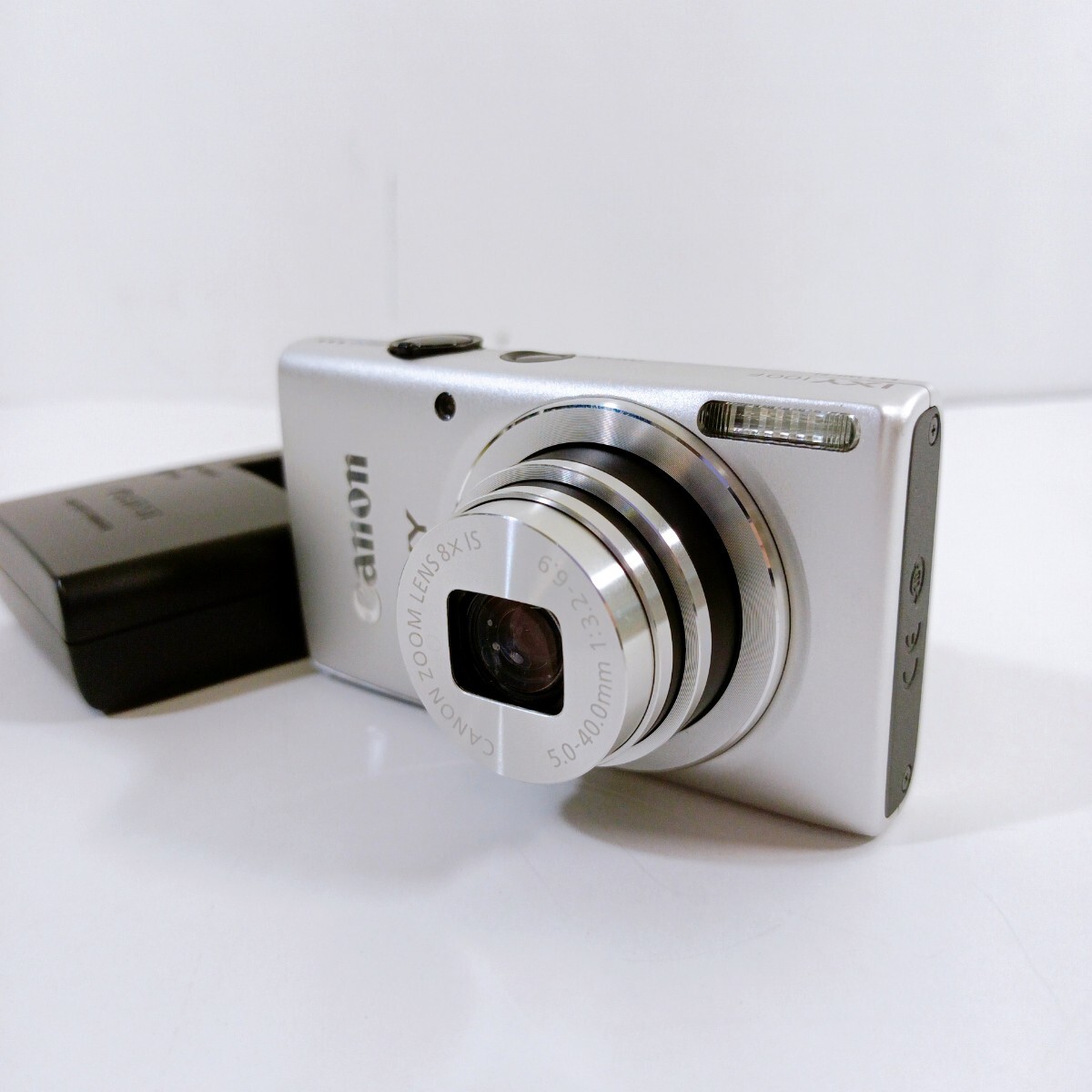 動作品 Canon キヤノン コンパクトデジタルカメラ IXY100F デジカメ 充電器付き シャッターOK フラッシュOKの画像1